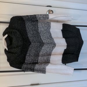 Black and white knit turtleneck sweater